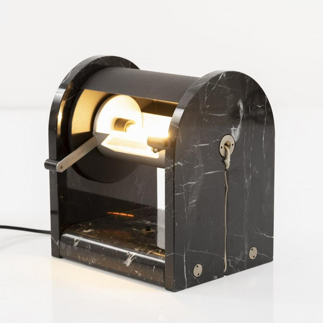 Andrea Bellosi, 'Arc en Ciel' table light, 1980: Andrea Bellosi, 'Arc en Ciel' table light, 1980, H. 28 x 24,7 x 20 cm. Made by Studio Alchimia, Milan. Black marble, sheet metal, black plastic, acrylic glass lens. Marked: ARC-EN-CIEL A. BELLOSI ITAL