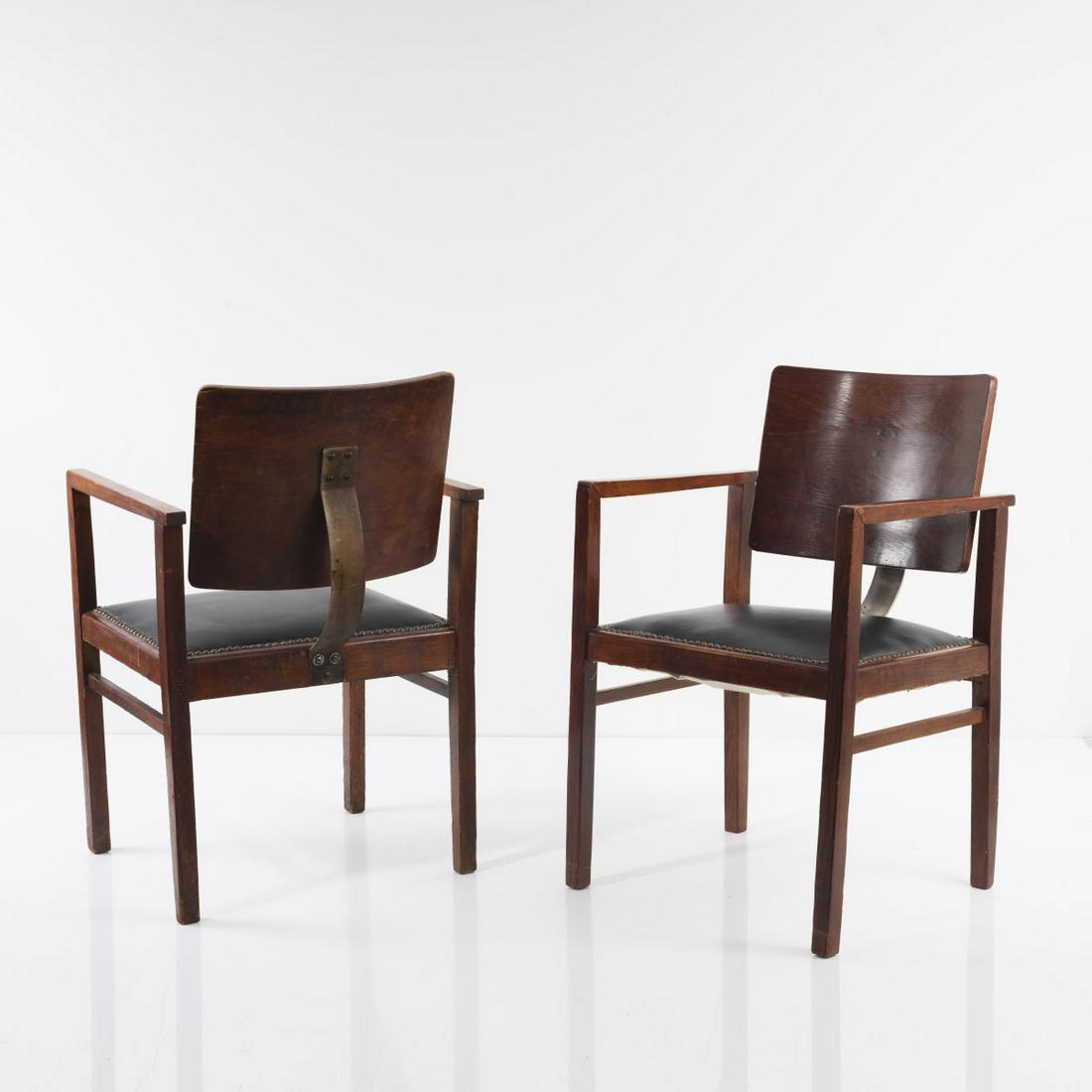 Lajos Kozma (attr.), Two armchairs, c. 1930: Lajos Kozma (attr.), Two armchairs, c. 1930, H. 85.5 x 56 x 56 cm. Made by Jozsef Heisler, Hungary (attr.). Walnut wood, plywood, stained dark, sheet metal, partly chromed, black leather, upholstery n
