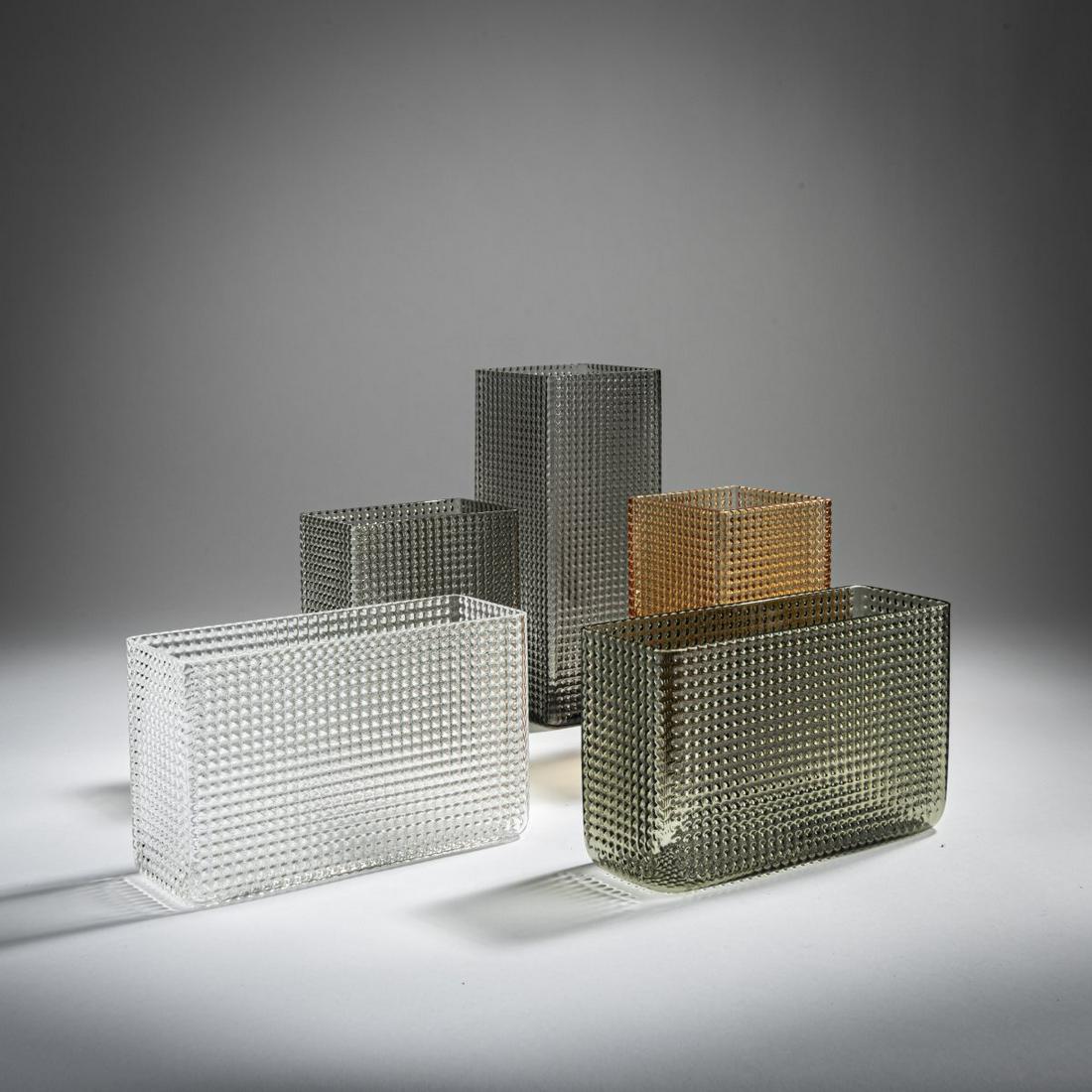 Sven Palmqvist, Five 'PU 3761' vases, 1960: Sven Palmqvist, Five 'PU 3761' vases, 1960, H. 10.3-19.7 cm. L. 8-17 cm. Made by Orrefors Glasbruk. Glass, clear, amber and grey. Marked: manufacturer's label (2x).,