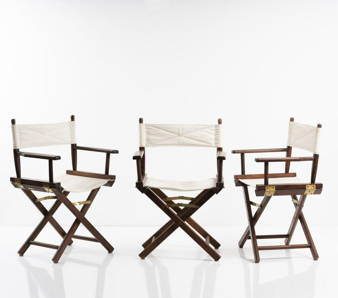 Peter Karpf (attr.), Three 'Trip Trap' folding chairs,: Peter Karpf (attr.), Three 'Trip Trap' folding chairs, 1980s, H. 90 x 56.5 x 55 cm; H. 90 x 12 x 55 cm (folded). Made by Trip Trap, Aalborg, Denmark.Beechwood, stained dark, brass, white textile. Mark