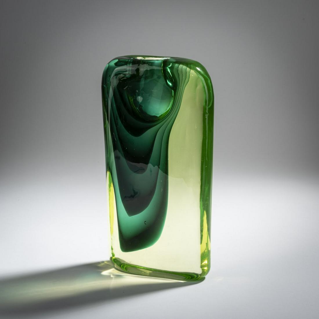 Antonio Da Ros, 'Contrappunto' vase, 1960: Antonio Da Ros, 'Contrappunto' vase, 1960, Oval glass block flattened on both sides with oval opening. H. 28.7 cm. Execution: Gino Cenedese. Cased glass, yellowish and green. , Cf. Marina Barovier, Ro