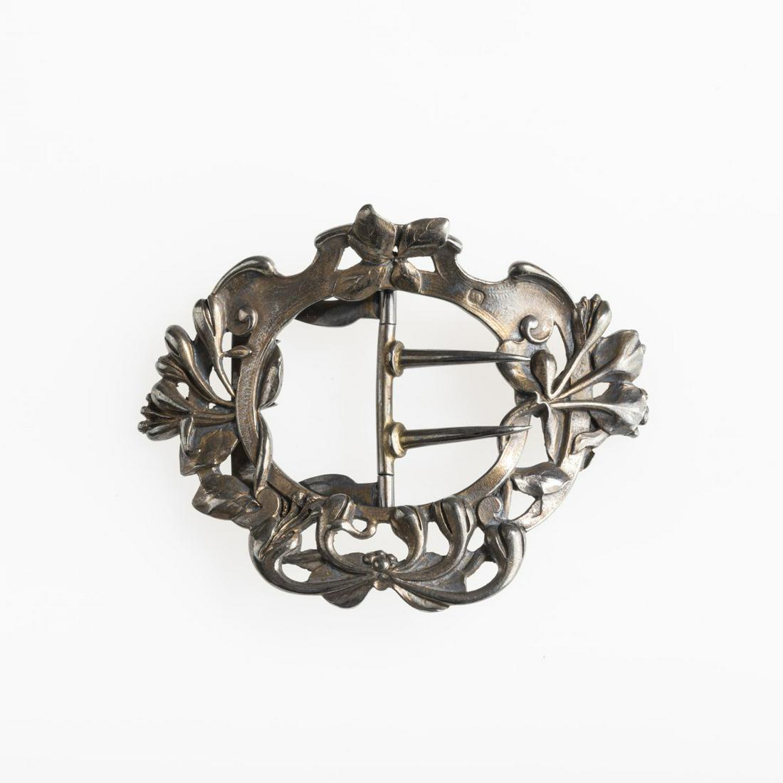 Alphonse Debain, Paris, Belt buckle, c. 1905: Alphonse Debain, Paris, Belt buckle, c. 1905, 6.7 x 8.7 cm. Silver. Marked several times: manufacturer's mark, Minerva head (embossed).,