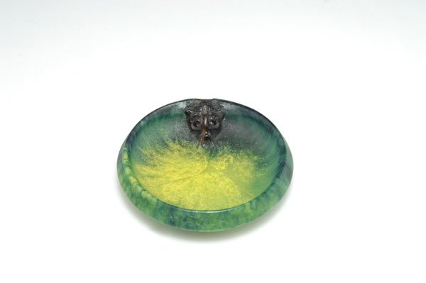 Walter, Amalric, Nancy: Amalric Walter, Nancy. Small bowl, 1920s. Diameter 9.5 cm. Designed by Andre Houillon. Pate de verre, translucid gathe, mould-melt, mostly yellowish and blue powder inclusions, reliefed mask. Monogram