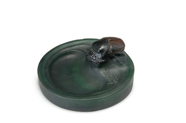 Walter, Amalric, Nancy: Amalric Walter, Nancy. 'Hanneton' bowl, 1920s. Diameter 11.5 cm. Designed by Henri Berge. Pate de verre, translucid gather, mould-melt, mostly dark-green. Chafer with black and dark-brown powder fusio