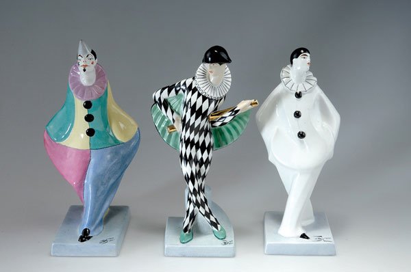 L'Hermine Pere & Fils, Guerin & Cie., Orchies: L'Hermine Pere & Fils, Guerin & Cie., Orchies. Three figurines of the Commedia dell'arte, 1920s. Pierrot (white), H. 32.4 cm; clown (gaudy), H. 34.5 cm; harlequin (black and white), H. 33.8 cm. Design