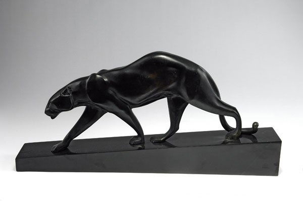 Susse Fres., Paris: Maurice Prost (1894 - 1967), Paris. Panther, c. 1928. H. 30 cm; 63 x 9 cm. Made by Susse Freres, Paris. Bronze with black patina, slate base. Base marked: M. Prost, SUSSE FReS EDITEURS PARIS.