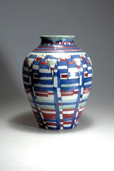Hedwig Bollhagen; Else Dörr. Vase, designed in 1927: Hedwig Bollhagen; Else Dörr. Vase, designed in 1927. H. 37.5 cm. Made by Steingutfabriken Velten-Vordamm, decoration by Else Dörr. Red majolica, glazed white, blue and dark-red, inside greenish-beig