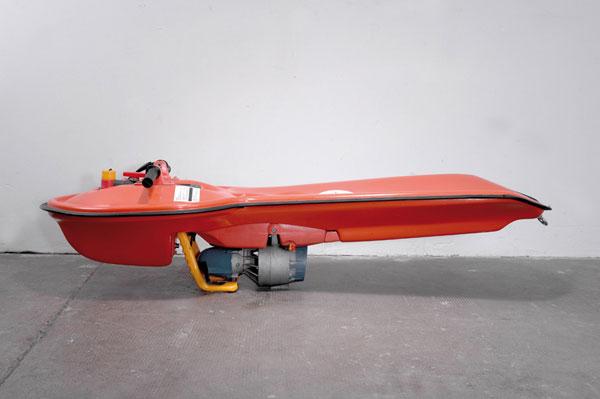 Bernd Böttger. 'Aqua Scooter with 'Water Flip', de: Bernd Böttger. 'Aqua Scooter with 'Water Flip', designed c. 1968. H. 44 x 58 x 170 cm. Made by ET, Western-Germany, in the 1970s. Plastic, yellow, orange and blue, engine. Marked: Label: ET WATER Fli
