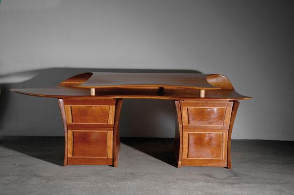 David Delthony. 'Clam' writing desk, designed and: David Delthony. 'Clam' writing desk, designed and made in 1994. H. 82 x 228 x 87.5 cm. American black cherry. Marked: Delthony 94.