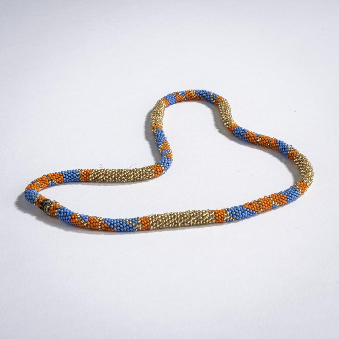 Maria Likarz, Beaded necklace, c. 1920: Maria Likarz, Beaded necklace, c. 1920, H. 21 cm. Orange, blue and gold glass beads, crocheted.,