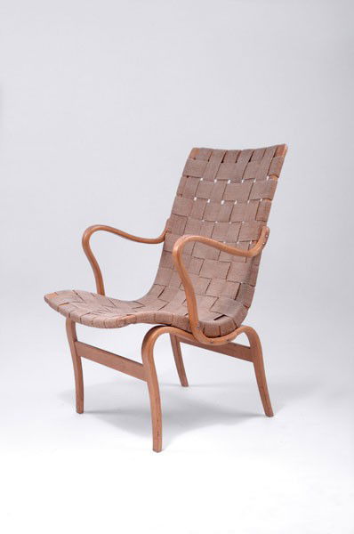 Mathsson, Bruno: Bruno Mathsson. 'Eva' armchair, designed in 1934. H. 84 x 59 x 70 cm. Made by Karl Mathsson, VŠrnamo. Birch plywood, hemp straps. Marked: BRUNO MATHSSON DESIGN MADE IN SWEDEN; FIRMA KARL MATHSSON MAD