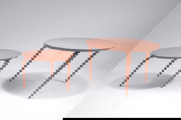 Mathsson, Bruno: Bruno Mathsson. Two side tables, designed in 1936. H. 29.5 cm; Diameter 45 cm; H. 41.5 cm; Diameter 65 cm. Made by Dux International AB. Carelian birch and birch. Marked: Bruno Mathsson by Dux.