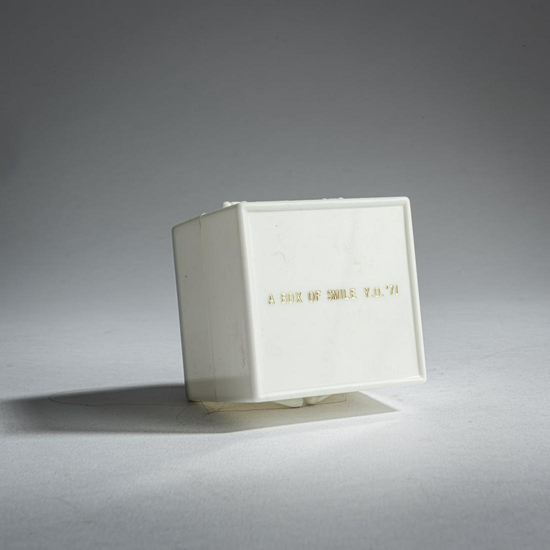 Yoko Ono (1933 Tokyo - lives in New York), 'Box of: Yoko Ono (1933 Tokyo - lives in New York), 'Box of smile', 1971, White plastic, printed gold, mirror (inside). 5.5 x 5.5 x 5.5 cm. Inscribed on the lid: A BOX OF SMILE Y.O. '71, Inscribed on the botto