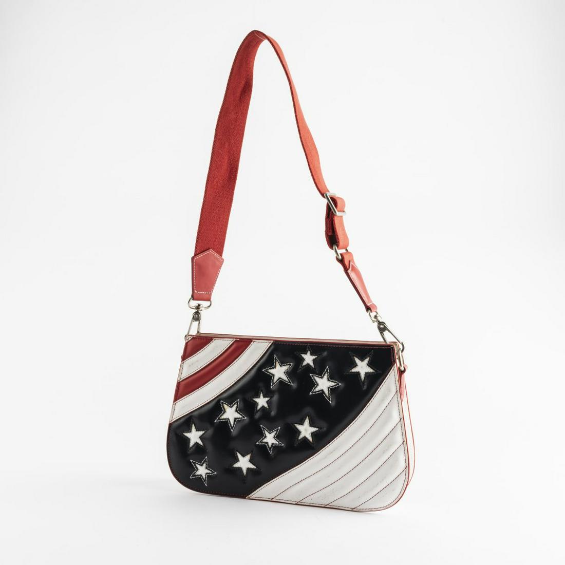 Etro, Milan, Shoulder bag with stars and stripes,: Etro, Milan, Shoulder bag with stars and stripes, Leather, textile lining, silver-colored hardware. H. 17 (max. 50) x 27 x 5,5 cm. Signed: ETRO Milano MADE IN ITALY.,