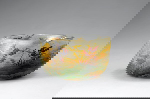 Daum Freres, Nancy. 'Orchidees' bowl, 1905-10. H.: Daum Freres, Nancy. 'Orchidees' bowl, 1905-10. H. 6.8 cm; Diameter 12.2 cm. Cased glass, clear, amber-coloured powder inclusions, green fused enamel. Etched and enamelled pattern with Orchid in bloom.