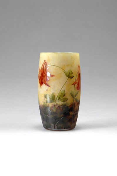 Daum Freres, Nancy. 'Ancolies' vase, circa 1910. H: Daum Freres, Nancy. 'Ancolies' vase, circa 1910. H. 12.2 cm. Cased glass, clear, lower part with purple, upper part with yellow powder inclusions. Etched and enamelled pattern with aquilegia. Signed: