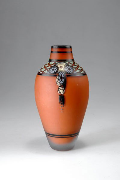 Andre Delatte, Nancy. Vase, 1920s. H. 25.2 cm. Cas: Andre Delatte, Nancy. Vase, 1920s. H. 25.2 cm. Cased glass, clear and opaque orange, matted. Frieze of reliefed enamel in blue, green, creamy-white and black, Grisaille paint. Signed: ADELATTE NANCY.