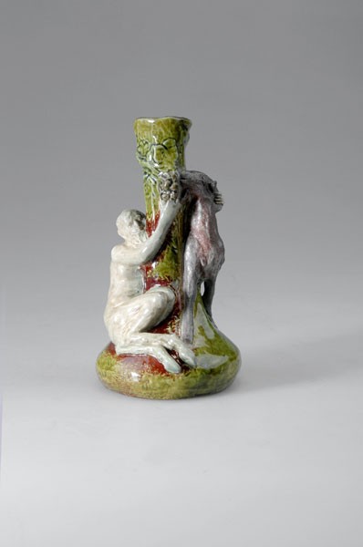 Emile Muller, Ivry. Vase with Pan and capricorn. H: Emile Muller, Ivry. Vase with Pan and capricorn. H. 15.6 cm. Designed by Hector Lemaire. Stoneware, glazed green and red. Signed: Hector Lemaire and E. Muller, original label EMILE MULLER 3 RUE HALeVY