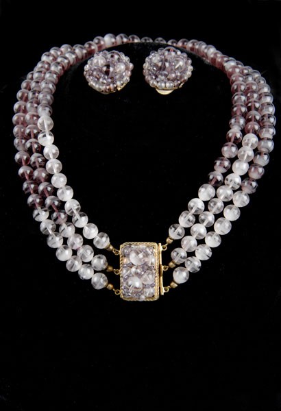 Coppola e Toppo, Milan. Necklace and pair of ear c: Coppola e Toppo, Milan. Necklace and pair of ear clips, 1950s. Necklace, L. 40.5 cm; ear clips, Diameter 2.5 cm. Designed by Lyda Coppola. Brass, purple glass. Marked: MADE IN ITALY by COPPOLA e TOPPO