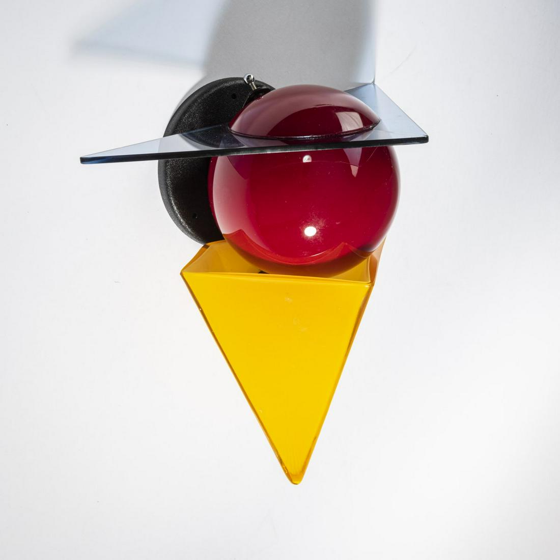 Adam D. Tihany; Joseph Mancini, Small 'Wassily off the: Adam D. Tihany; Joseph Mancini, Small 'Wassily off the Wall' wall light, 1985, H. 34.5 x 32.5 x 19 cm. Made by Foscarini srl, Marcon. Sheet metal, painted black, glass, yellow, red and blue. Marked: m