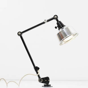 Curt Fischer; Wolfgang Fischer, 'Midgard' wall light,: Curt Fischer; Wolfgang Fischer, 'Midgard' wall light, 1950s, L. 94 cm, Ø 16.5 cm. Made by Industrial works Auma; Ronneberger & Fischer. Tubular metal, painted black, sheet metal. Marked: ma