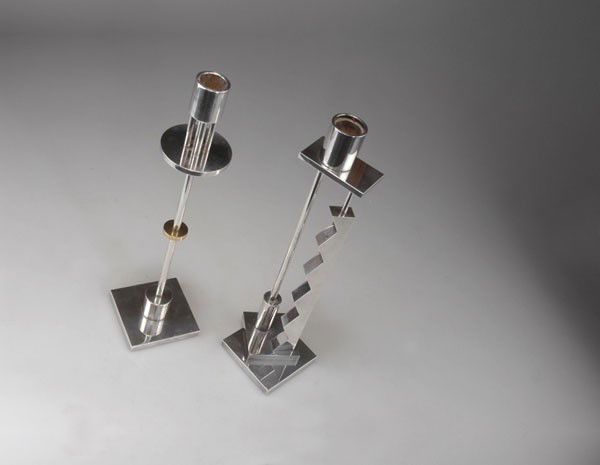 Ettore Sottsass. Pair of 'Silvershade' candlesticks: Ettore Sottsass. Pair of 'Silvershade' candlesticks, designed in 1986. H. 32.2-32.8 cm. Made by Swid Powell, New York. Silver-plated metal, brass. Marked: c SWID POWELL, E. Sottsass, SILVER PLATED MAD