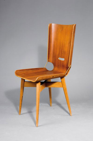 Giancarlo De Carlo. 'Lucania' chair, designed in 19: Giancarlo De Carlo. 'Lucania' chair, designed in 1954. H. 95.5 x 53 x 51.5 cm. Made by Arflex, Milan, in the 1950s. Plywood, nut veneer, beechwood, brass rods.