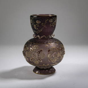 Daum Frères, Nancy, Small vase, c. 1892: Daum Frères, Nancy, Small vase, c. 1892, H. 13.4 cm. Cased glass, colorless/violet. Floral decor, etched, enameled and gilded. Twelve melted cabochons as pistils, applied curled ribbons.