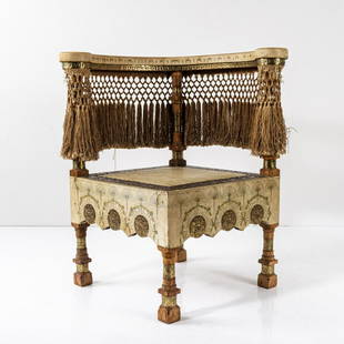 Carlo Bugatti, Corner chair, 1895-1900: Carlo Bugatti, Corner chair, 1895-1900, Four-legged. The round backrest ends in circular handles. H. 72.5 cm, 67 x 64 cm. Turned and carved fruit wood, covered with parchment, painted with Egyptian de