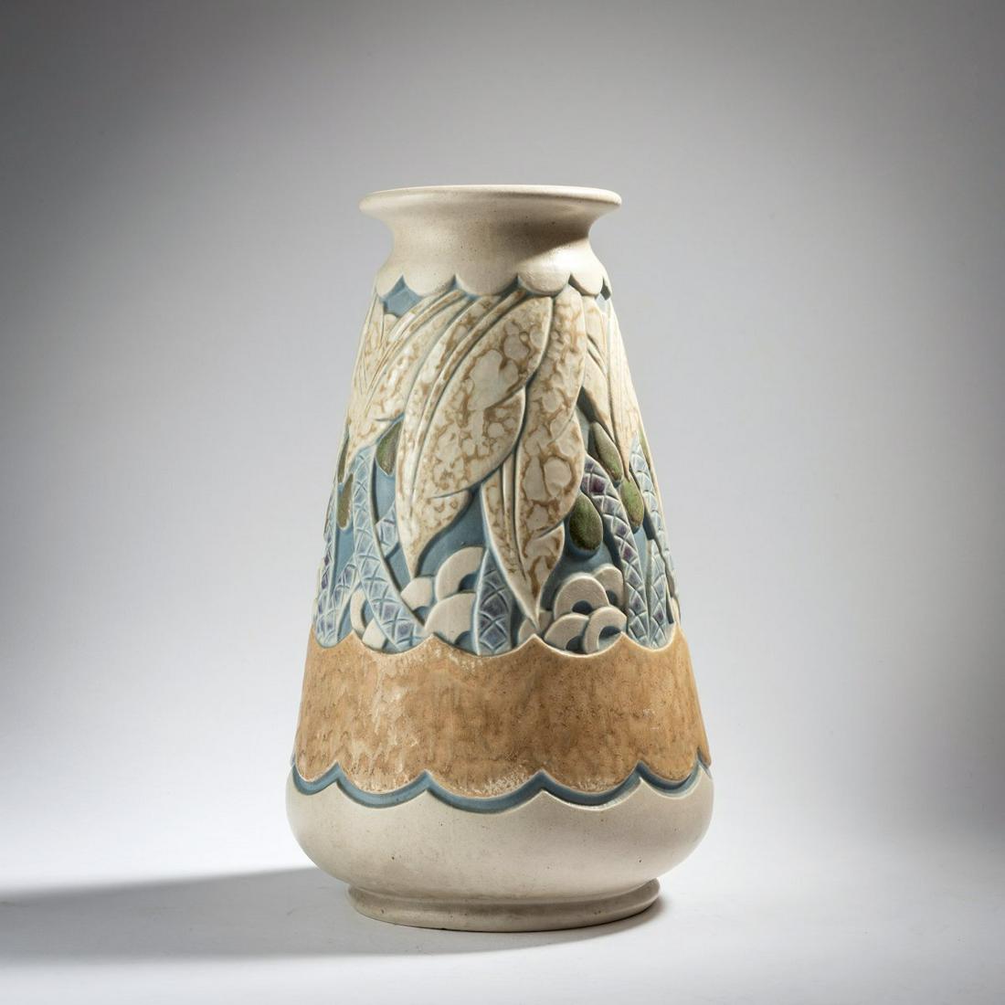 Géo Condé, Tall 'Palmtrees' vase, c. 1930: Géo Condé, Tall 'Palmtrees' vase, c. 1930, Cone with retracted stand and open mouth. H. 38.5 cm. Made by Joseph & Pierre Mougin, Nancy. Stoneware, relief, polychrome matt glaze with