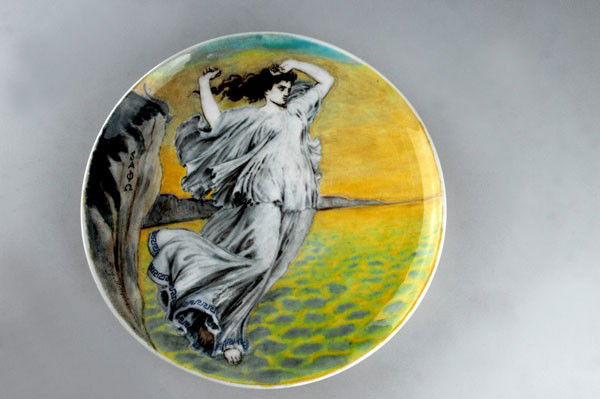 Theodore Deck, Sevres. 'Sappho' plate, circa 1900. Diam: Theodore Deck, Sevres. 'Sappho' plate, circa 1900. Diameter 29.8 cm. Painting by Joseph-Emile Millochau. Earthenware, polychromatic paint on white. Greek poet Sapho. Marked: Safo in Greek characters,