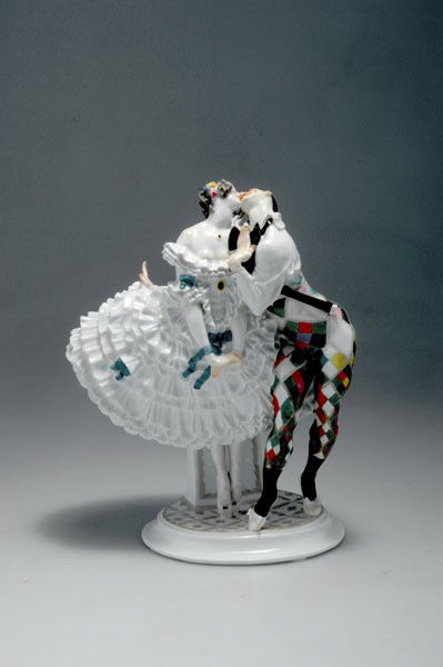 KPM Meissen. 'Harlequin and Columbine', 1914. H.27 cm. : KPM Meissen. 'Harlequin and Columbine', 1914. H.27 cm. Designed by Paul Scheurich. Made prior to 1924. Porcelain, white, glazed, polychromatic overglaze. Marked: Maker's mark, D. 287, 121, 67.