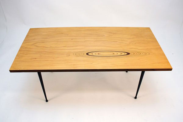 Tapio Wirkkala. Coffee table, designed in 1954. H. 46 x: Tapio Wirkkala. Coffee table, designed in 1954. H. 46 x 124 x 62 cm. Produced by Oy Asko Ab. Table top of veneered elm with plywood eye, sides of veneered teak, metal legs. Marked: made in finland ask