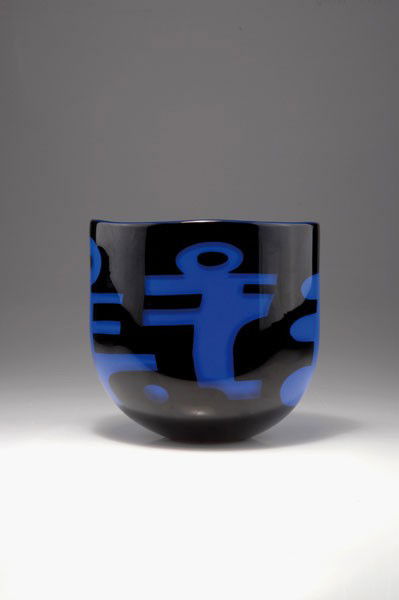 Lars Hellsten. 'Small Blue Lion' vase, designed in 1992: Lars Hellsten. 'Small Blue Lion' vase, designed in 1992. H. 19.8 cm. Made by Orrefors Glasbruk. Cased glass, blue and black, between layers pattern with lion and human figures. Marked: Artist's signat