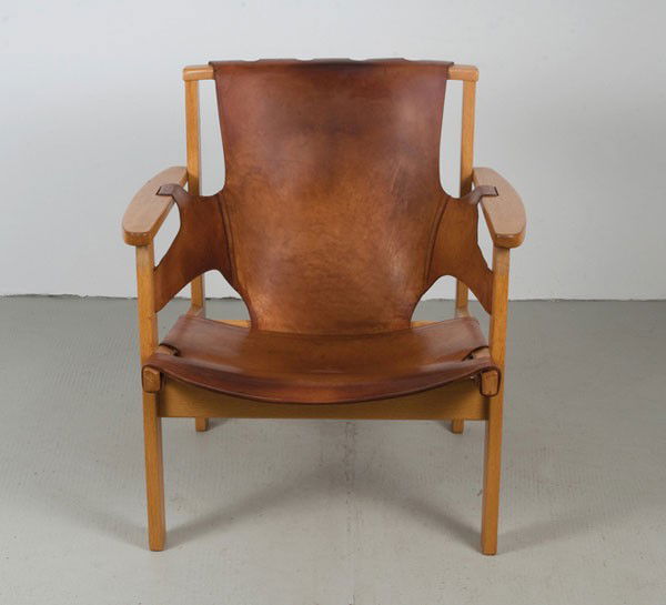 Carl-Axel Acking. Armchair, designed in 1957. H. 76.5 x: Carl-Axel Acking. Armchair, designed in 1957. H. 76.5 x 70 x 73 cm. Made by Kallemo, Varnamo for Enka. Oakwood, core leather.