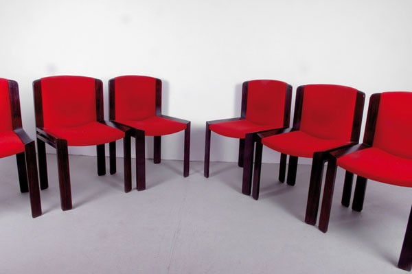 Joe Colombo: Joe Colombo. Six '300' chairs, designed in 1966. H. 78.5 x 48.5 x 51 cm. Made by Pozzi, Mariano Comense. Beechwood, stained dark, red fabric.