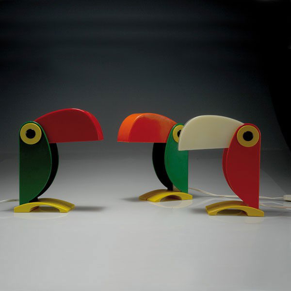 Old Timer Ferrari, Verona. Three 'Tucano' table lights,: Old Timer Ferrari, Verona. Three 'Tucano' table lights, 1970s. H. 27 cm. Plastic, orange, green, yellow, white and black. Marked: Old Timer Ferrari, design OTF Verona, mode. brev. patent Made in Italy