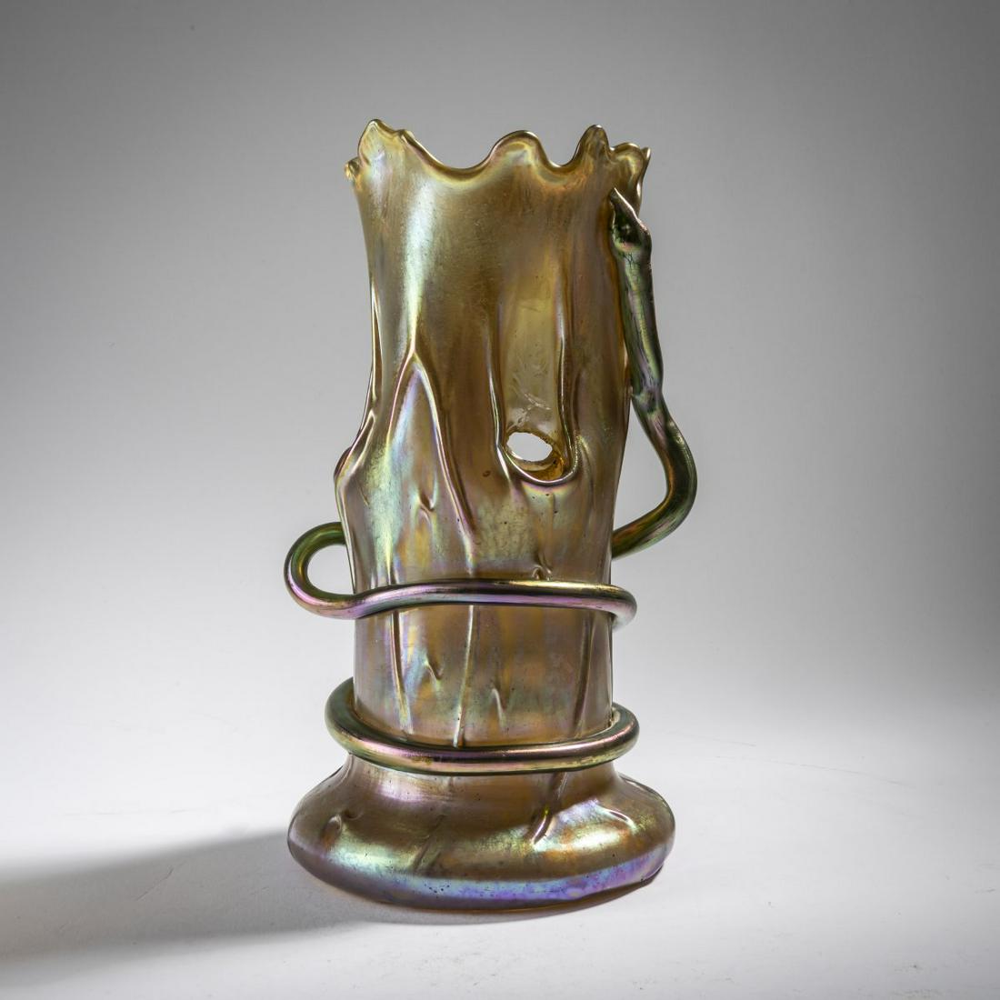 Loetz, Klášterský Mlýn, 'Tree trunk vase' with a snake, c. 1902: Loetz, Klášterský Mlýn, 'Tree trunk vase' with a snake, c. 1902, H. 25,5 cm. Colorless glass, dense silver-yellow crumbs, gold and pearlescent matt luster, Candia Silberiri