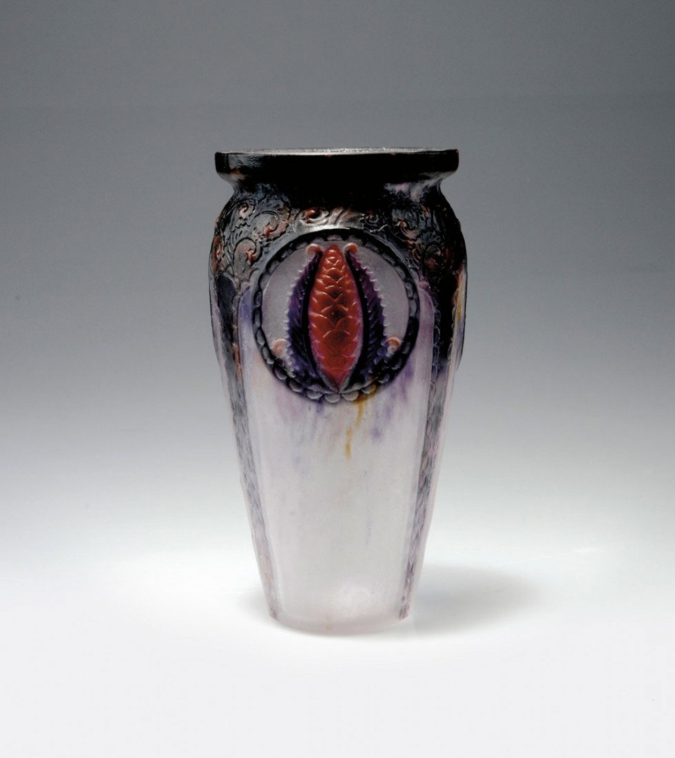 Vase 'Coniferes', 1924: Gabriel Argy-Rousseau, Paris. 'Coniferes' vase, 1924. H. 17.5 cm. P‰te de verre, translucid gather, mould-melt, purple powder inclusions, fusions in raspberry red and purple. Relief with three medal