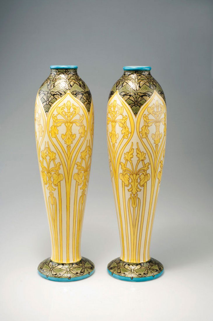 Paar Vasen, um 1900: Paul Jean Milet, Sevres. Pair of vases, circa 1900. H. 47.7 cm. Earthenware, yellow iris on vanilla yellow ground, rim and base with depiction of butterflies in Gold with black and brown enamel cloiso