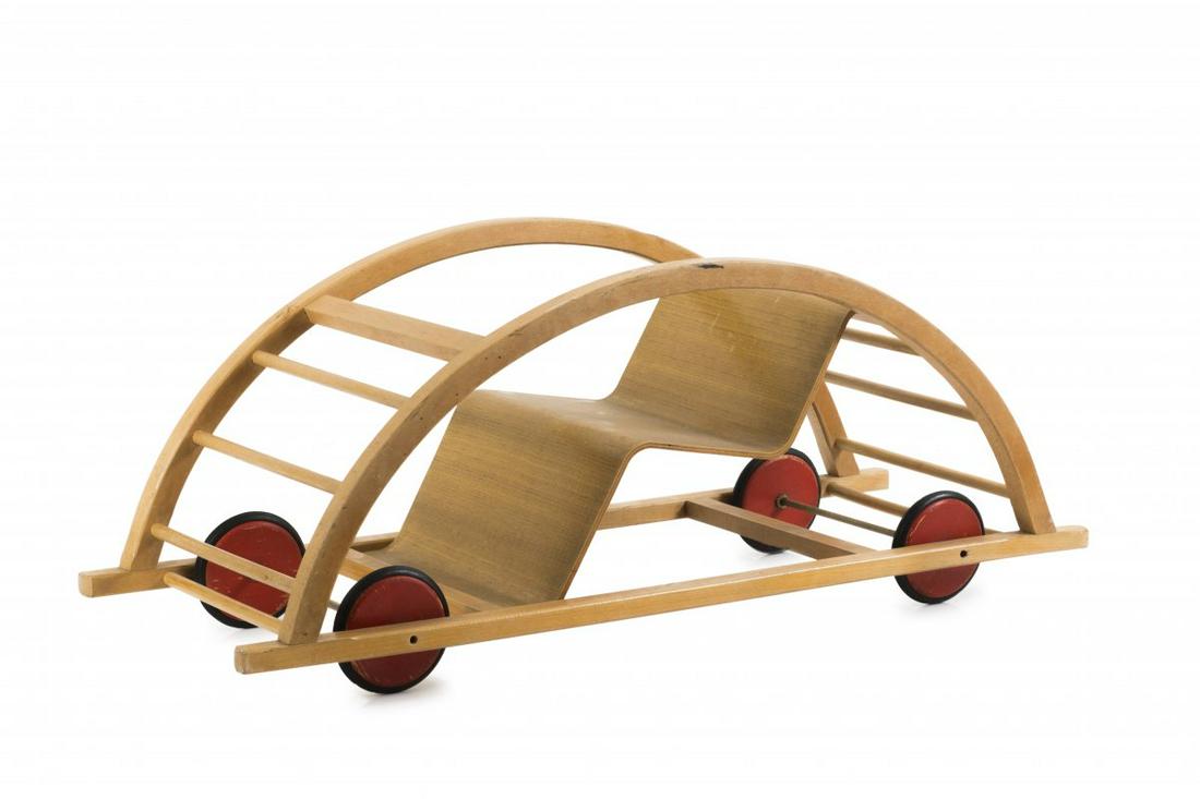 Hans Brockhage, Rocking chair/car, 1950: Hans Brockhage, Rocking chair/car, 1950, H. 39 x 99.5 x 38 cm. Made by Siegfried Lenz, Bergiesshübel/Pirna. Beech and plywood, red wheels, rubber. , Exh. cat. Fidgety Philip! A Design History of