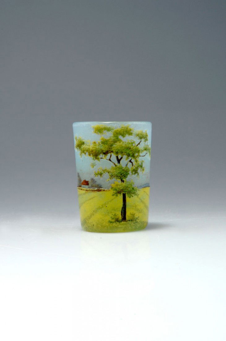 Vase 'Messidor', 1908: Daum Freres, Nancy. 'Messidor' vase, 1908. H. 5 cm. Cased glass, clear, milky opalescent powder inclusions, yellow enamel fusions. Etched and enamelled pattern with landscape with fields, trees and fa