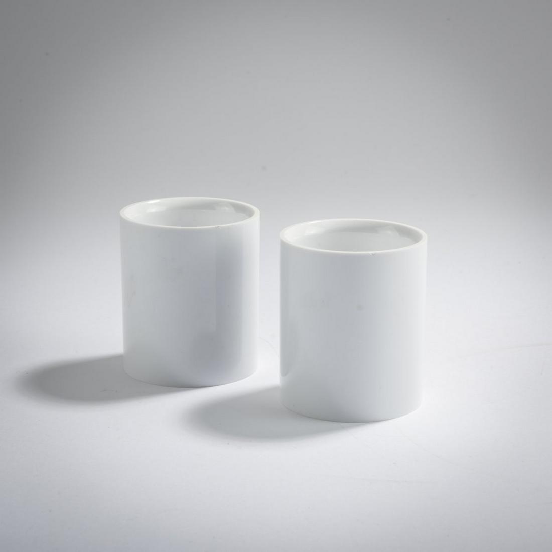 Enzo Mari, Two 'Hawaii' egg cups, 1972: Enzo Mari, Two 'Hawaii' egg cups, 1972, H. 6 cm, Ø 5.5 cm. Made by Danese, Milan. Food grade melamine, white. Marked: manufacturer's stamp., Cat. Danese Milano 1976, no. 6.
