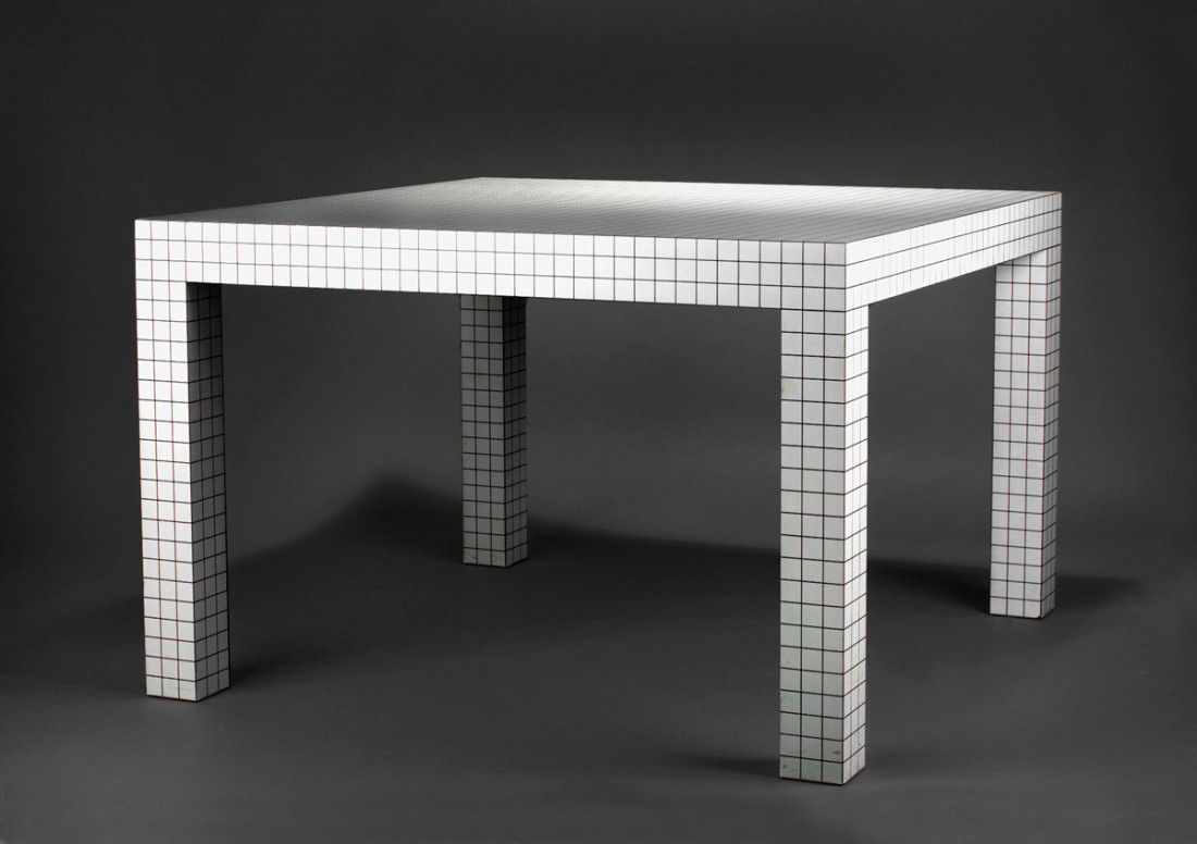 Tisch 'Quaderna': Superstudio. 'Quaderna' table, designed in 1971. H. 72.5 x 126 x 126 cm. Made by Zanotta, Milan. Wood, white plastic laminate with printed black lines.