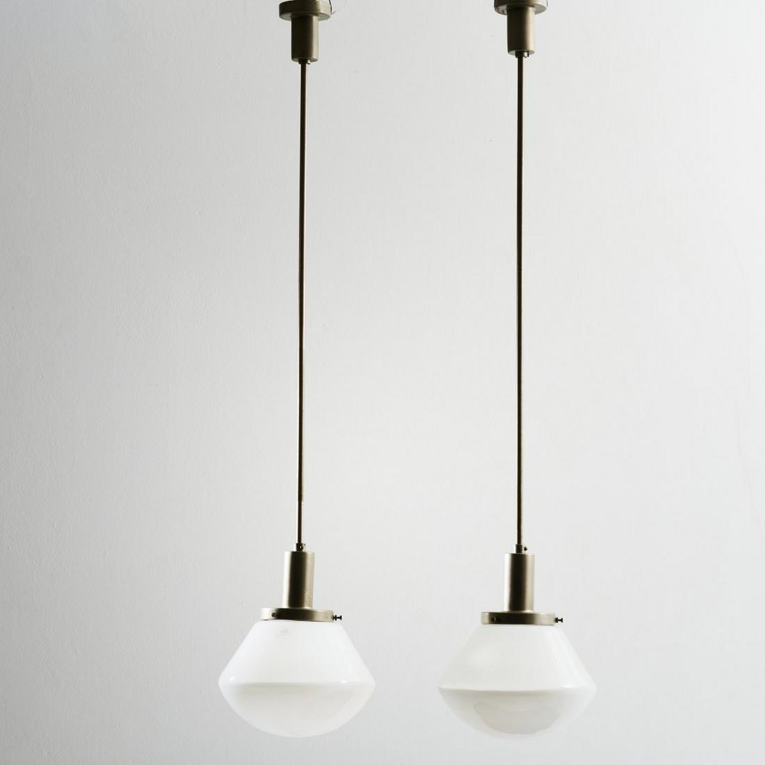 Hin Bredendieck; Hermann Gautel (ATTR.), Two '777' pendant lights, um 1934: Hin Bredendieck; Hermann Gautel (ATTR.), Two '777' pendant lights, um 1934, H. 133 cm (with suspension), Ø 30 cm. Made by Körting & Mathiesen A.-G., Leipzig-Leutzsch. Tubular metal, sh