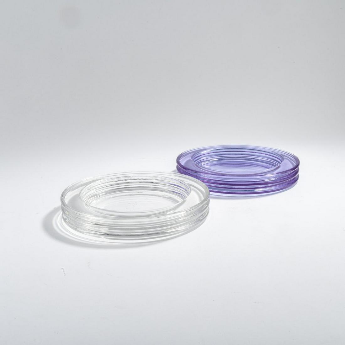 Sergio Asti , Two ashtrays from the 'Onda' series 1970: Sergio Asti , Two ashtrays from the 'Onda' series 1970, Ø 21 cm. Made by Arnolfo di Cambio, Colle Val d'Elsa, Siena. Glass, colorless and violet.,