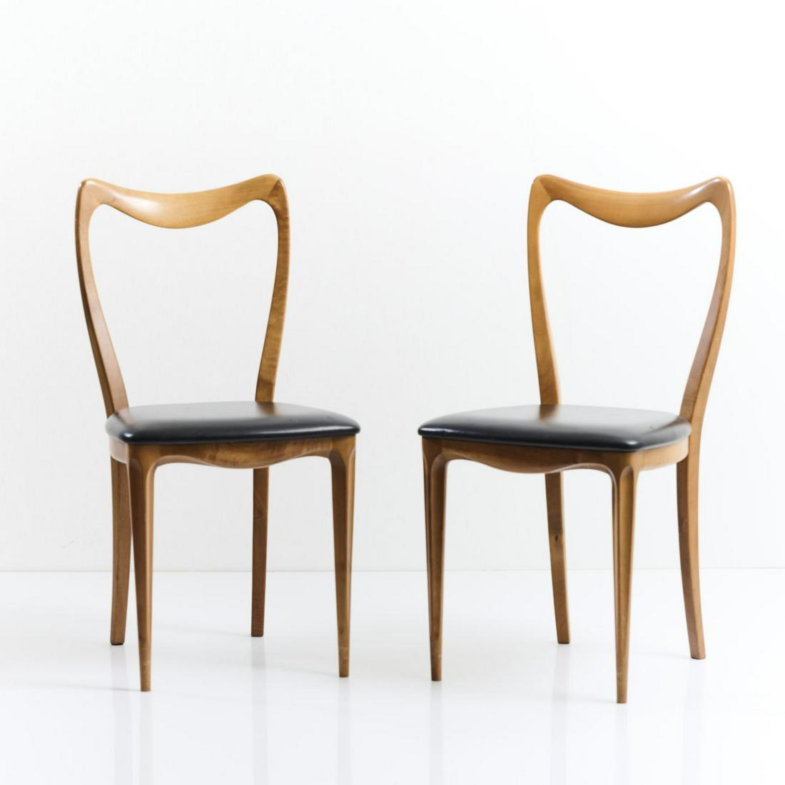 Guglielmo Ulrich (ATTR.), Two chairs, 1950s: Guglielmo Ulrich (ATTR.), Two chairs, 1950s, H. 86.5 x 43 x 49 cm. Made by Pozzi, Mariano Comense, 1970s. Walnut, leather, black. Marked: Pozzi, logo on the underside of the pad.,
