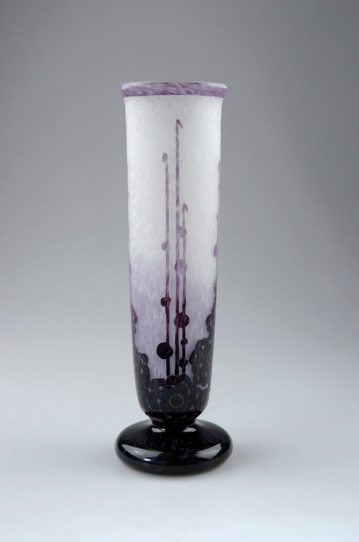 Vase 'Roses trémières', 1927-28: Verreries Schneider, Epinay-sur-Seine. 'Roses trémières' vase, 1927-28. H. 37.3 cm. Cased glass, clear, milky white powder inclusions, purple enamel fusion with blue dots. Multiply etched pattern wi