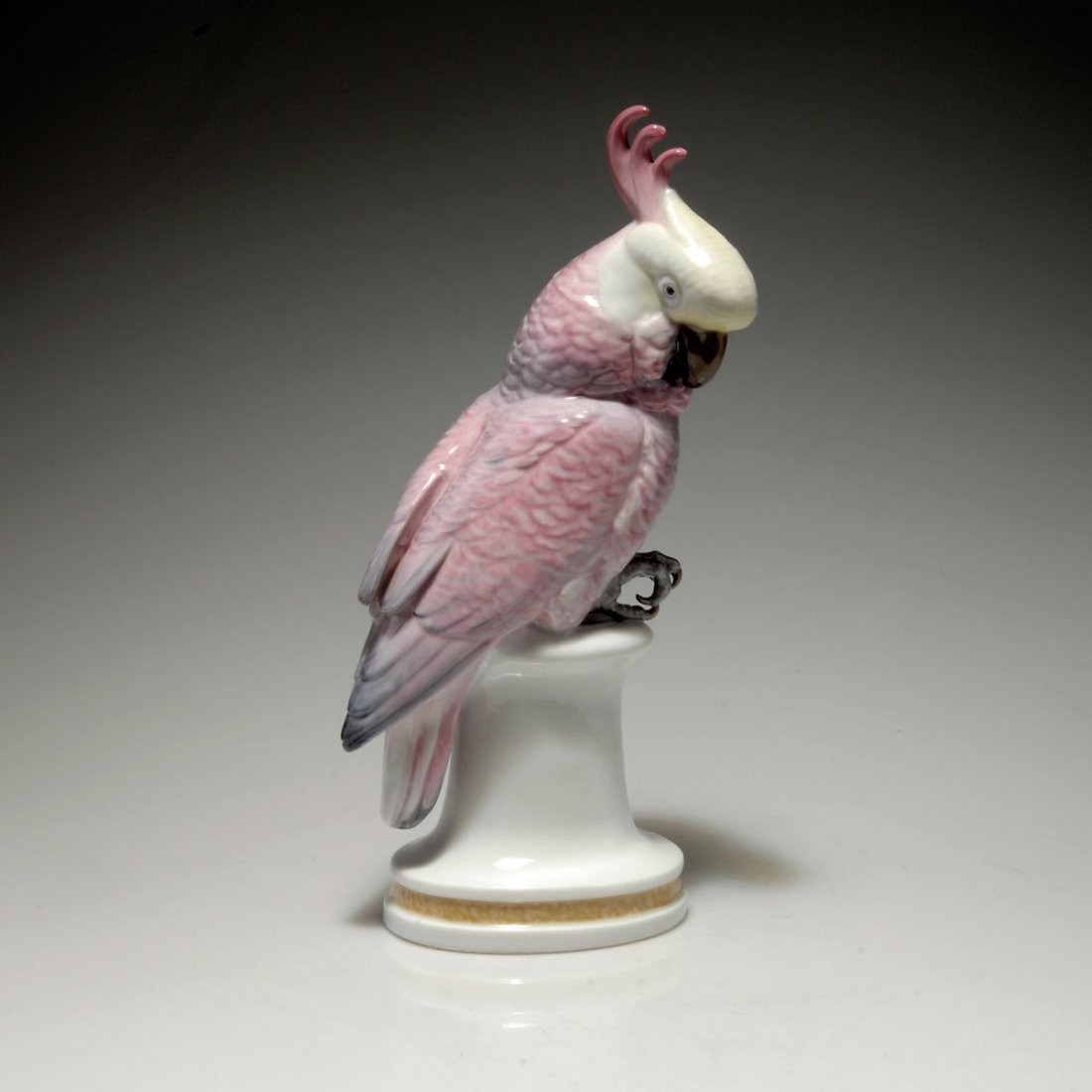 Kakadu, 1919: Karl Ens, Volkstedt. Cocatoo, 1919. H. 33.3 cm. Porcelain, white, glazed, overglaze in brown, lightyellow, black, pink and grey, base light-brown. Marked: Maker's mark, 4967 II /.