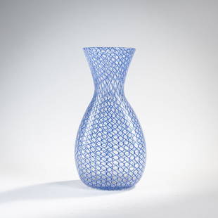 Dino Martens, 'Zanfirico a trina' vase, c. 1958: Model no. 6723. H. 24 cm. Execution: Aureliano Toso. Ribbons made of colorless glass with blue spiral thread. Literature: Cf. Marc Heiremans, Dino Martens, Stuttgart 1999, p. 134; cf. Marc Heiremans,